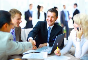 Business people shaking hands, finishing up a meeting