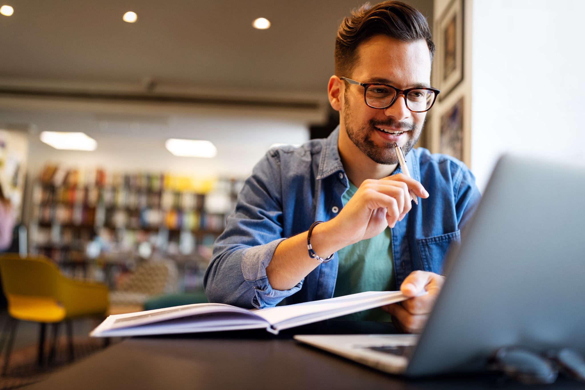 Smiling AP student studying insurance course