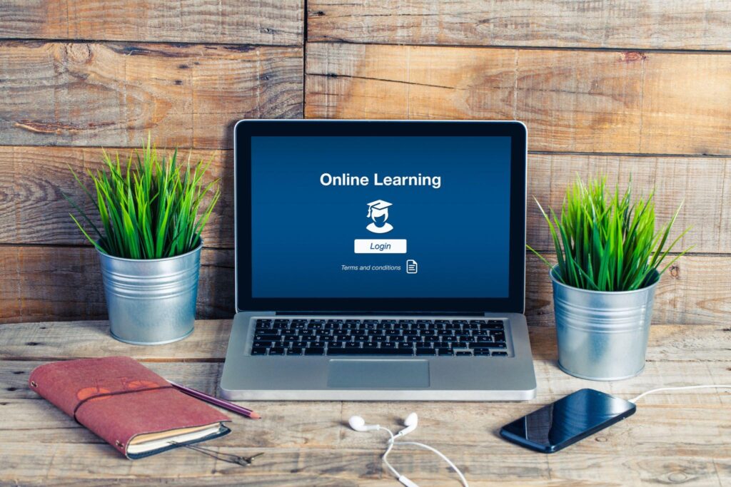 Online learning desk. Wood desk in a workplace.