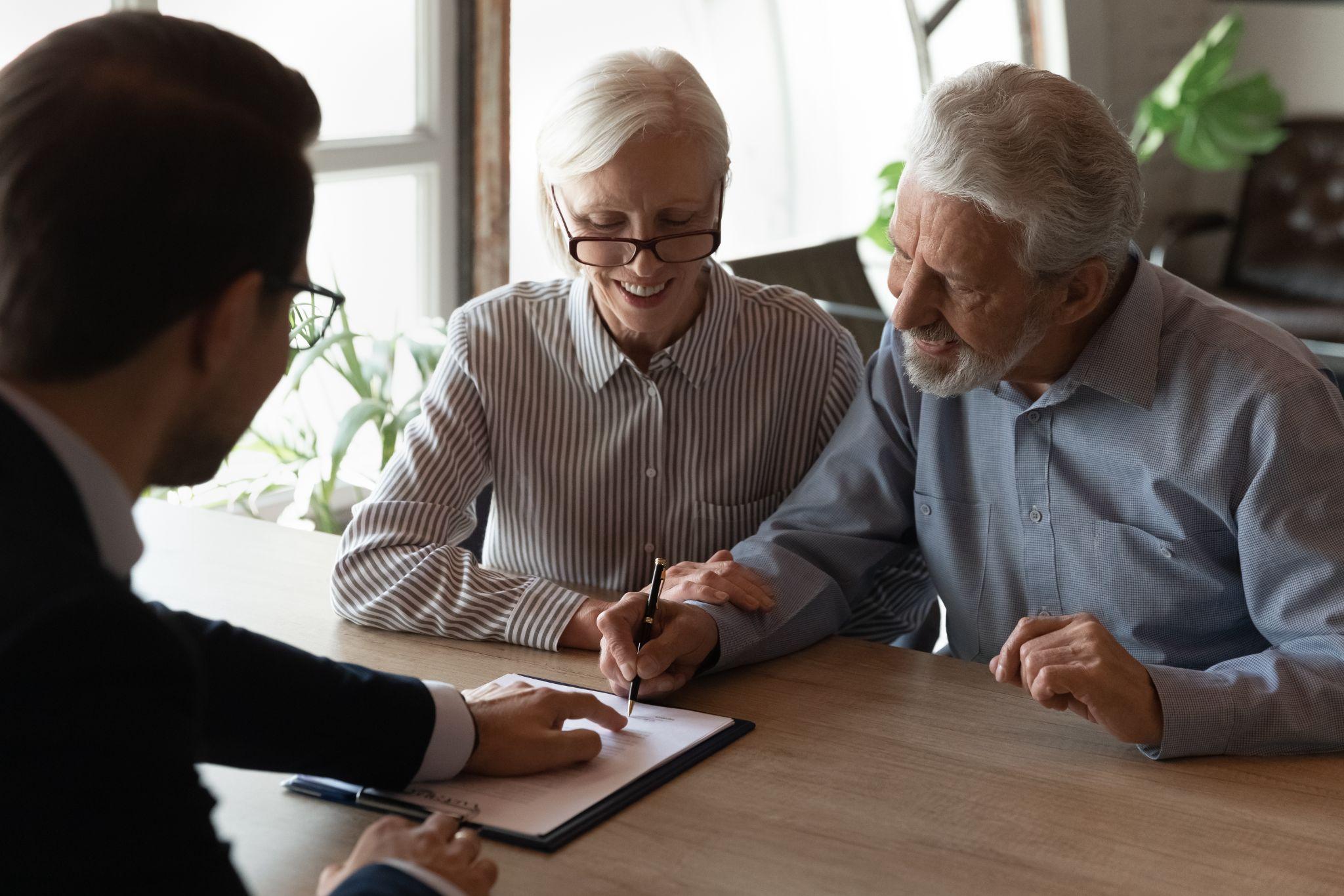 Insurance agent helping clients
